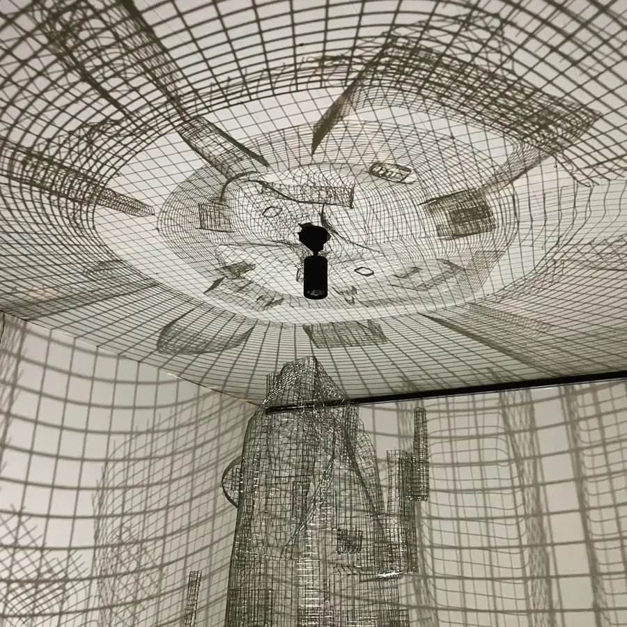 Grid structure seen from below inside a patterned room