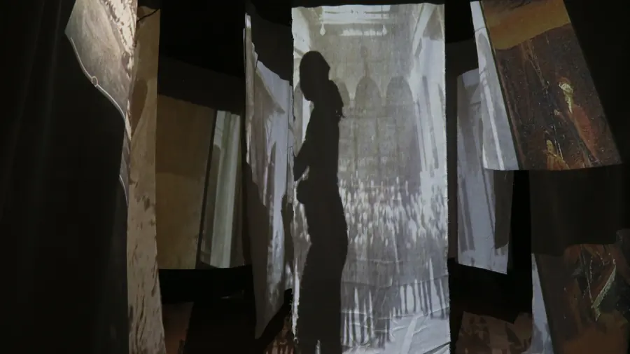 Hanging translucent sheets with projected shadows of buildings